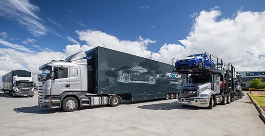 Prixcar trucks transporting cars
